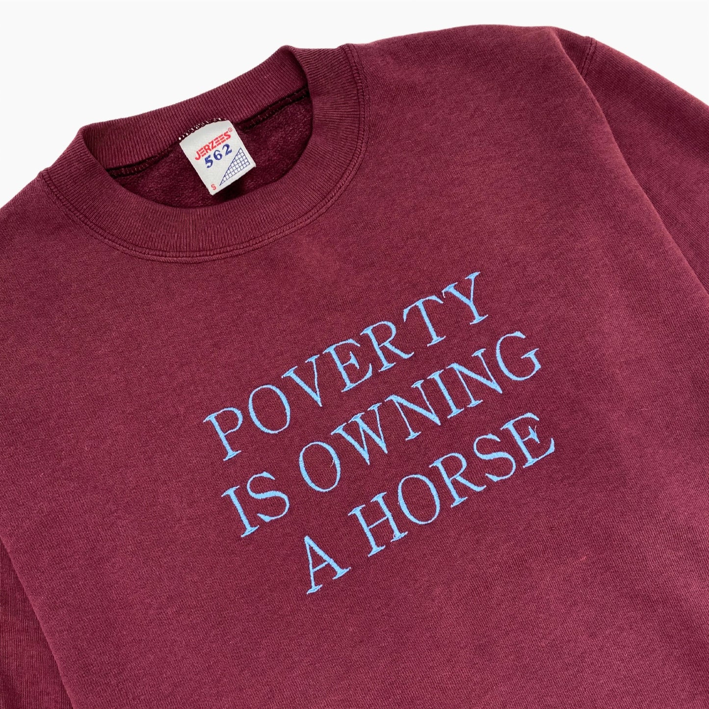 00S "POVERTY IS OWNING A HORSE" SWEATER | S