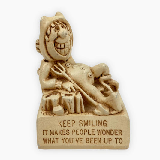 70S "KEEP SMILING" SCULPTURE