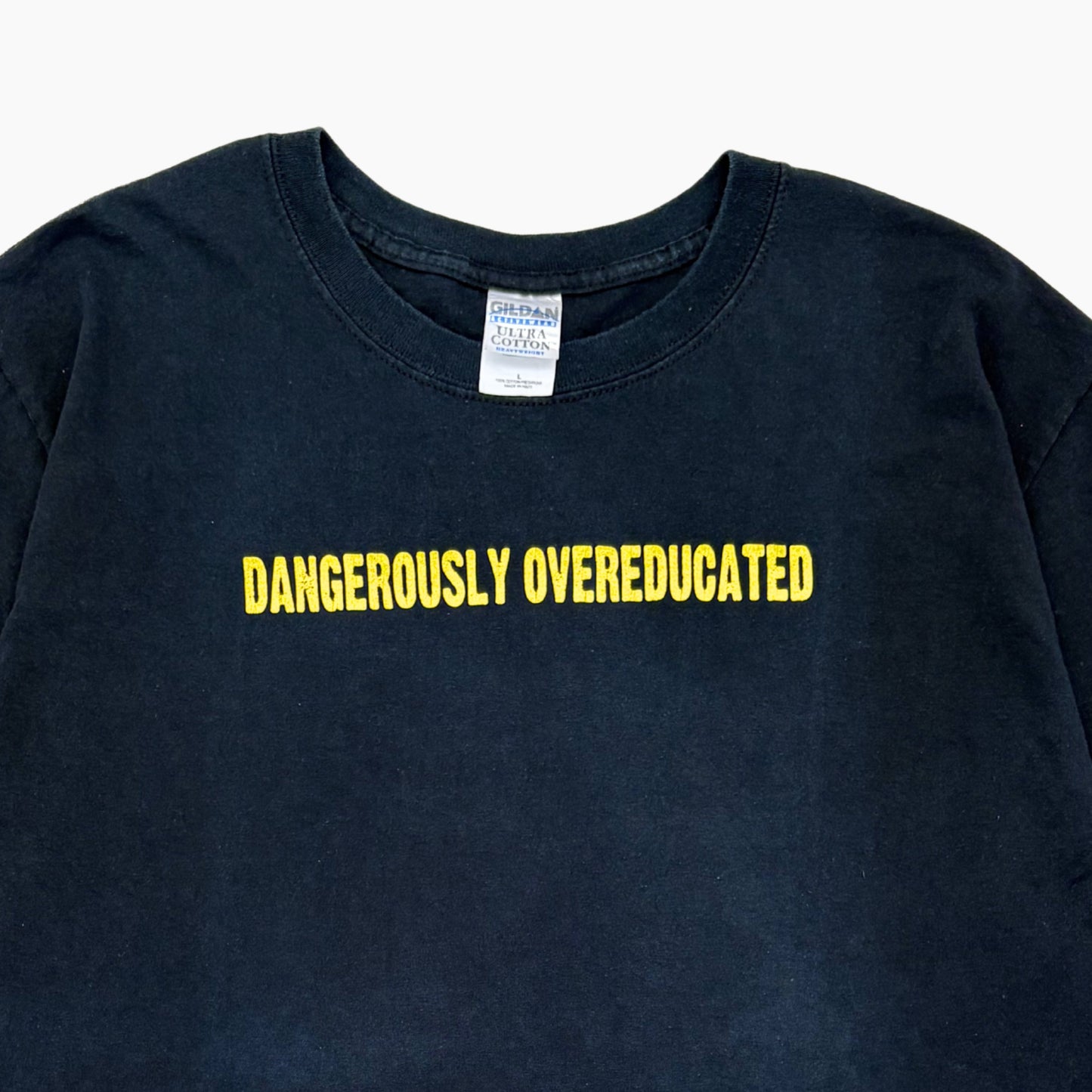 EARLY 00S 'DANGEROUSLY OVEREDUCATED' T-SHIRT | L