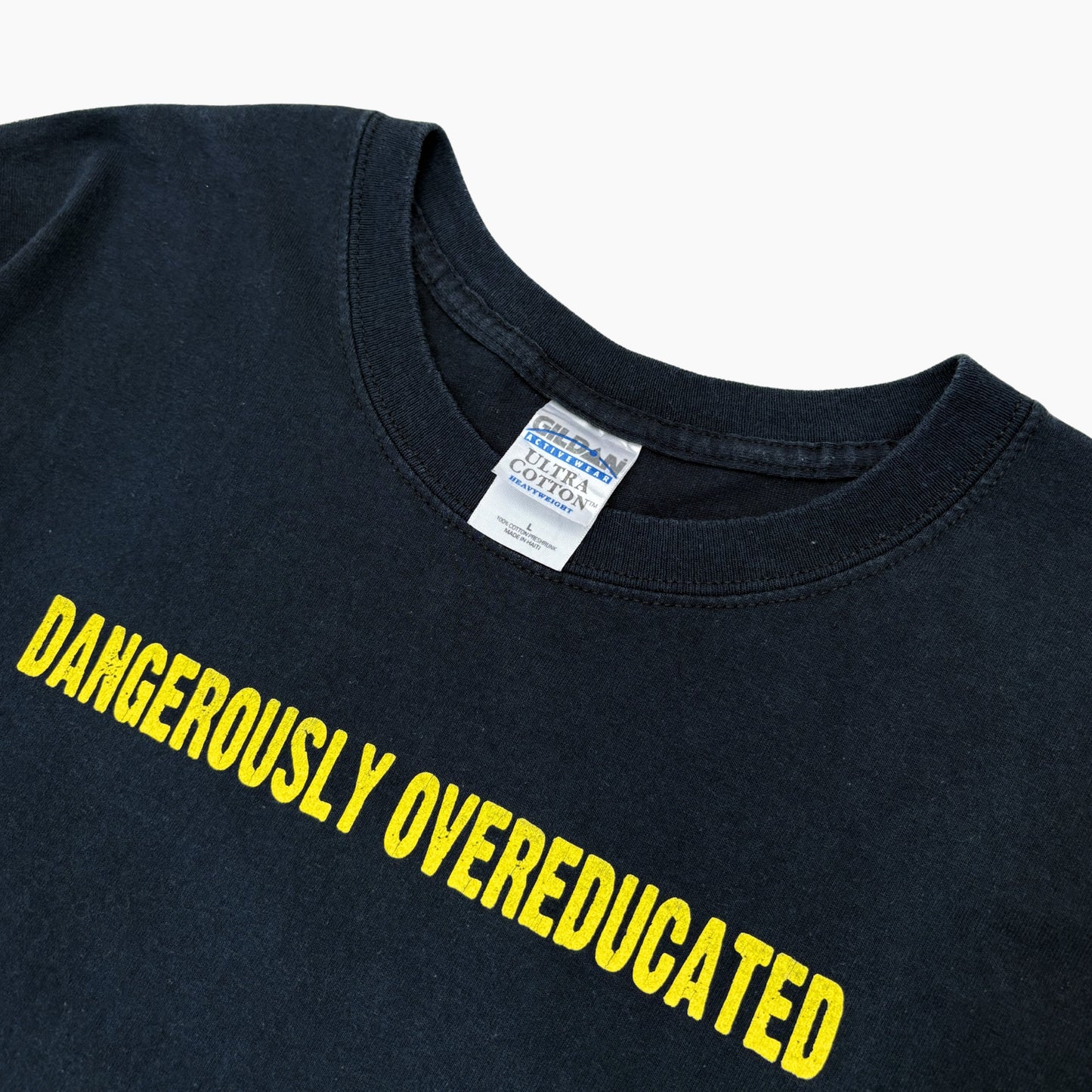 EARLY 00S 'DANGEROUSLY OVEREDUCATED' T-SHIRT | L